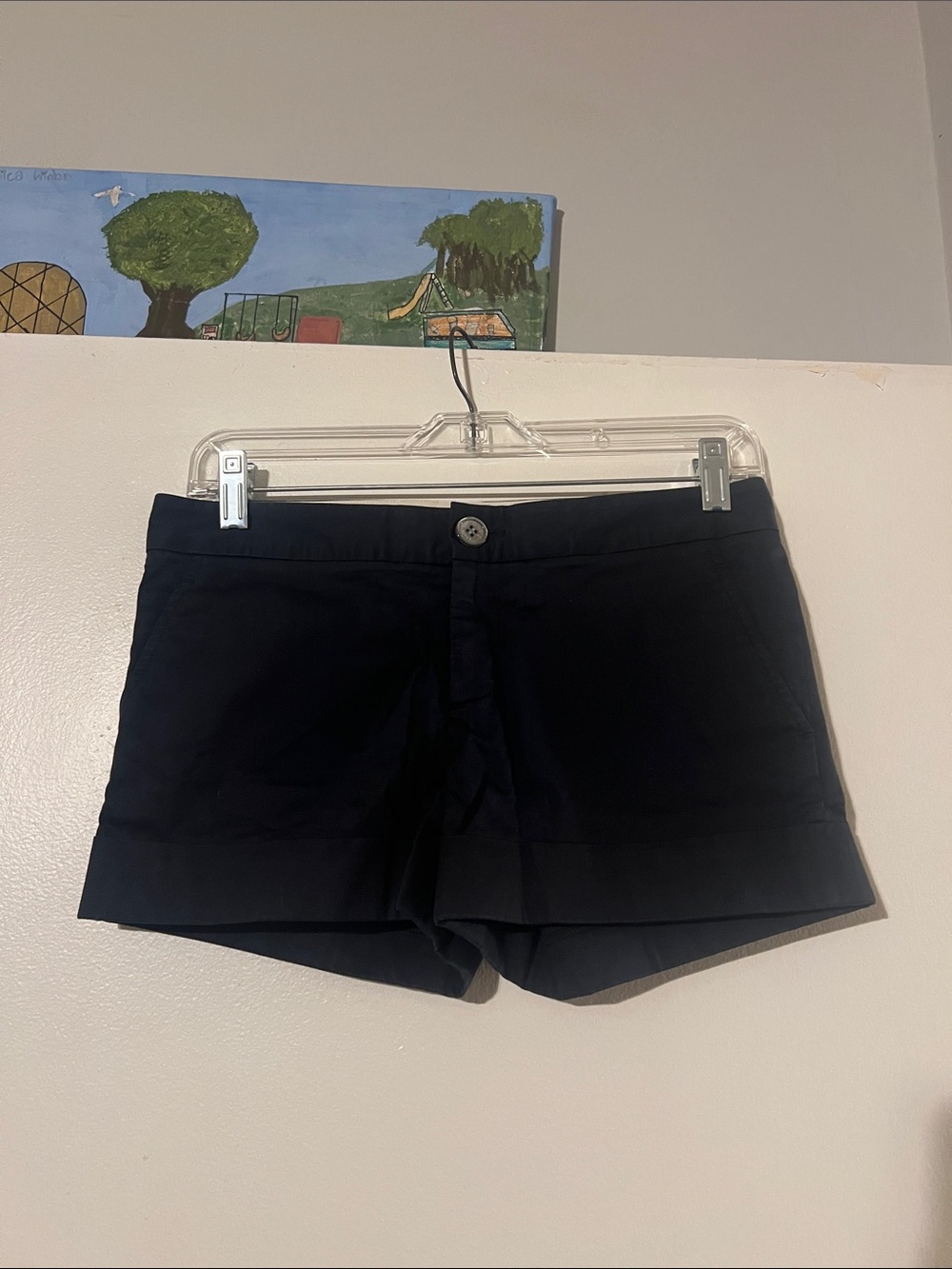 Raven black cuffed flat front shorts.